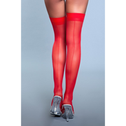 Sheer red thigh-high stockings with a back seam and clear heels.