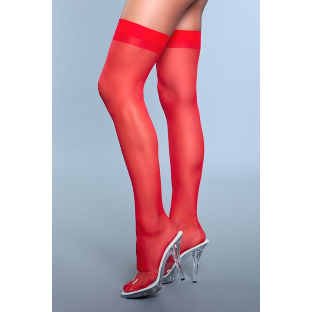 Sheer red thigh-high stockings with a back seam and clear heels.