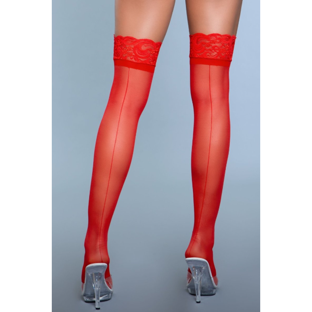 Sheer red lace thigh-high stockings with a back seam and clear heels.