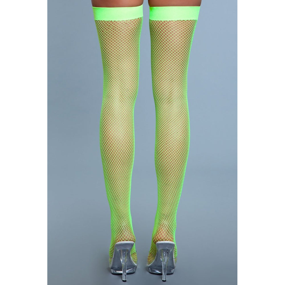 Neon green fishnet thigh-high stockings with a solid band.