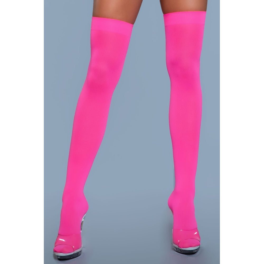 Opaque hot pink nylon thigh-high stockings.