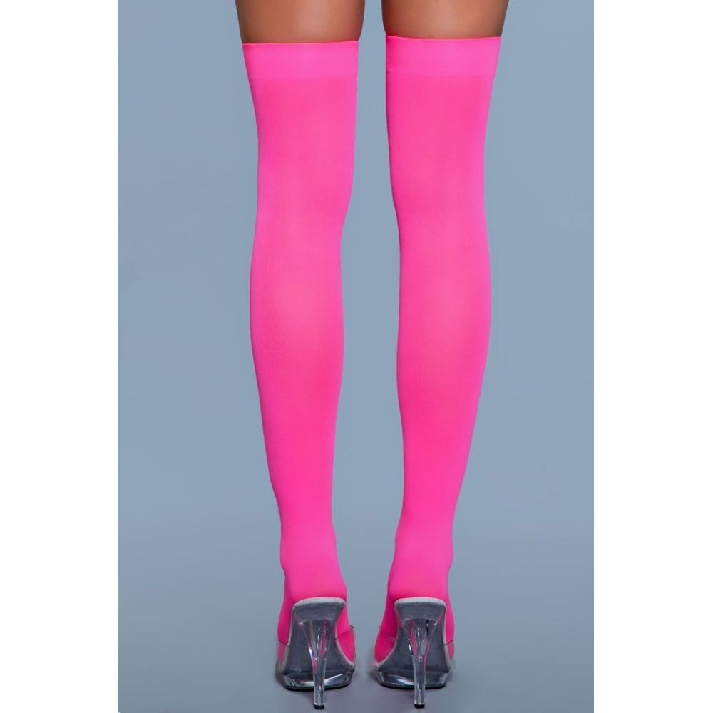 Opaque hot pink nylon thigh-high stockings.