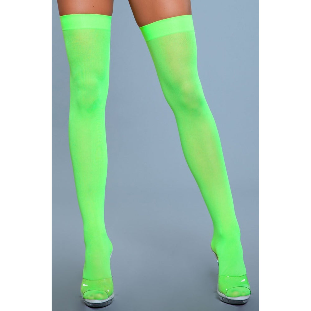 Neon green opaque nylon thigh-high stockings with a solid band.