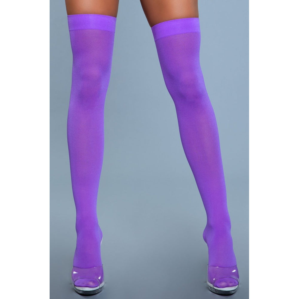 Purple opaque nylon thigh-high stockings with clear heels.