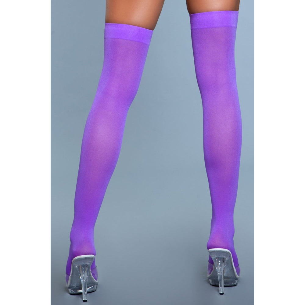 Purple opaque nylon thigh-high stockings with clear heels.