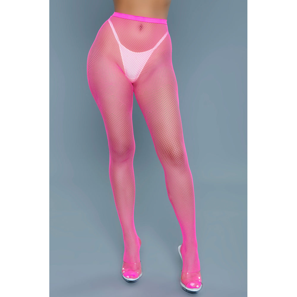 Hot pink mini fishnet pantyhose with a white thong and clear heels.