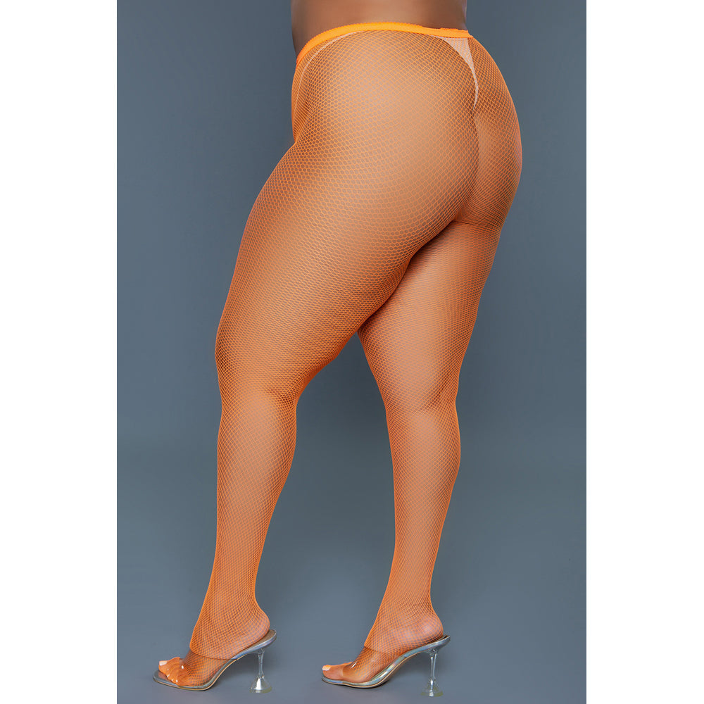 Orange mini fishnet pantyhose on a model.