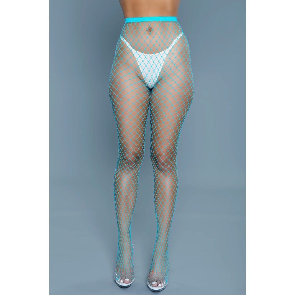 Turquoise oversized fishnet pantyhose worn with a white thong.