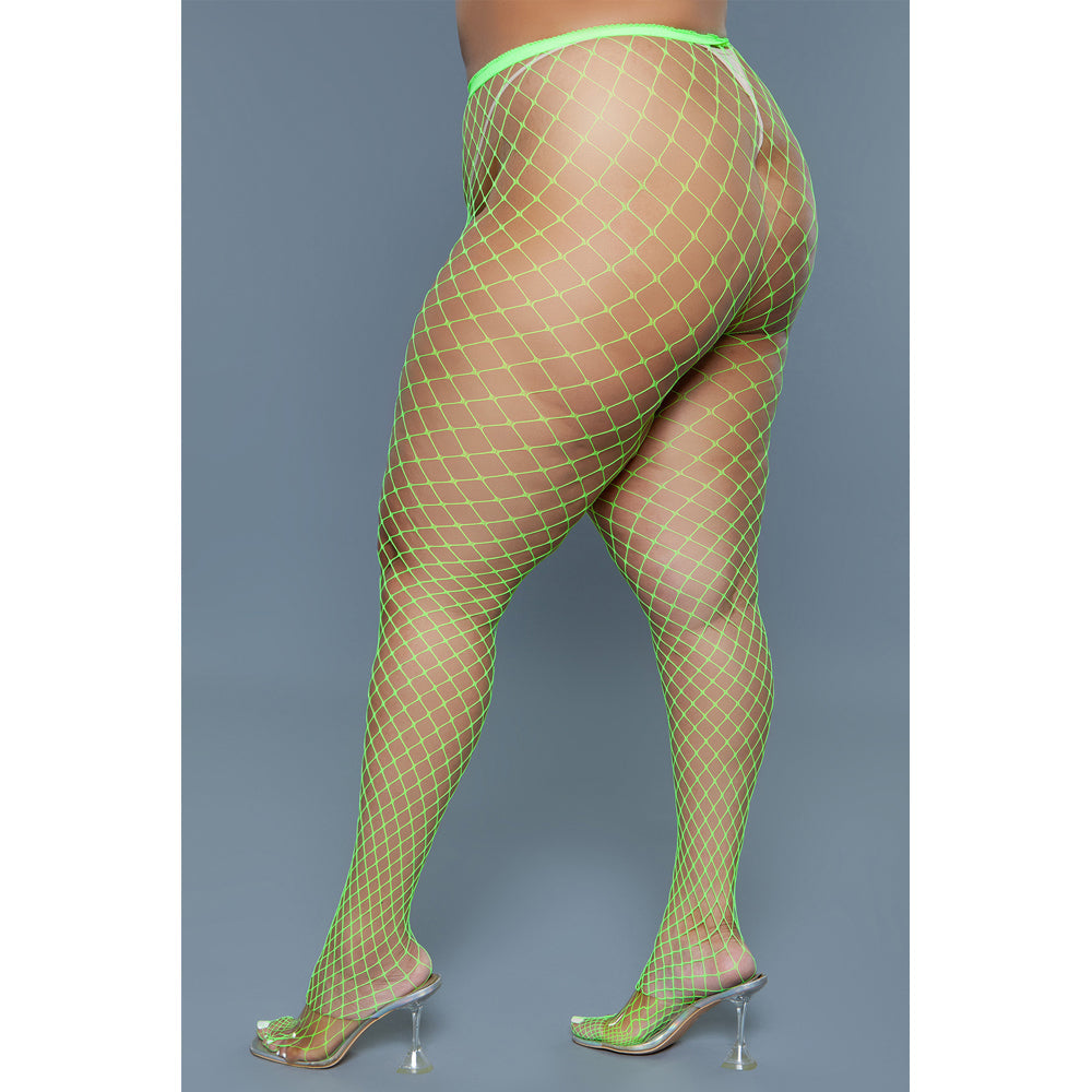 Neon green oversized fishnet pantyhose.