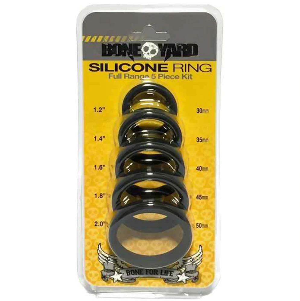 Black silicone cock ring set with five sizes ranging from 1.2 to 2.0 inches.