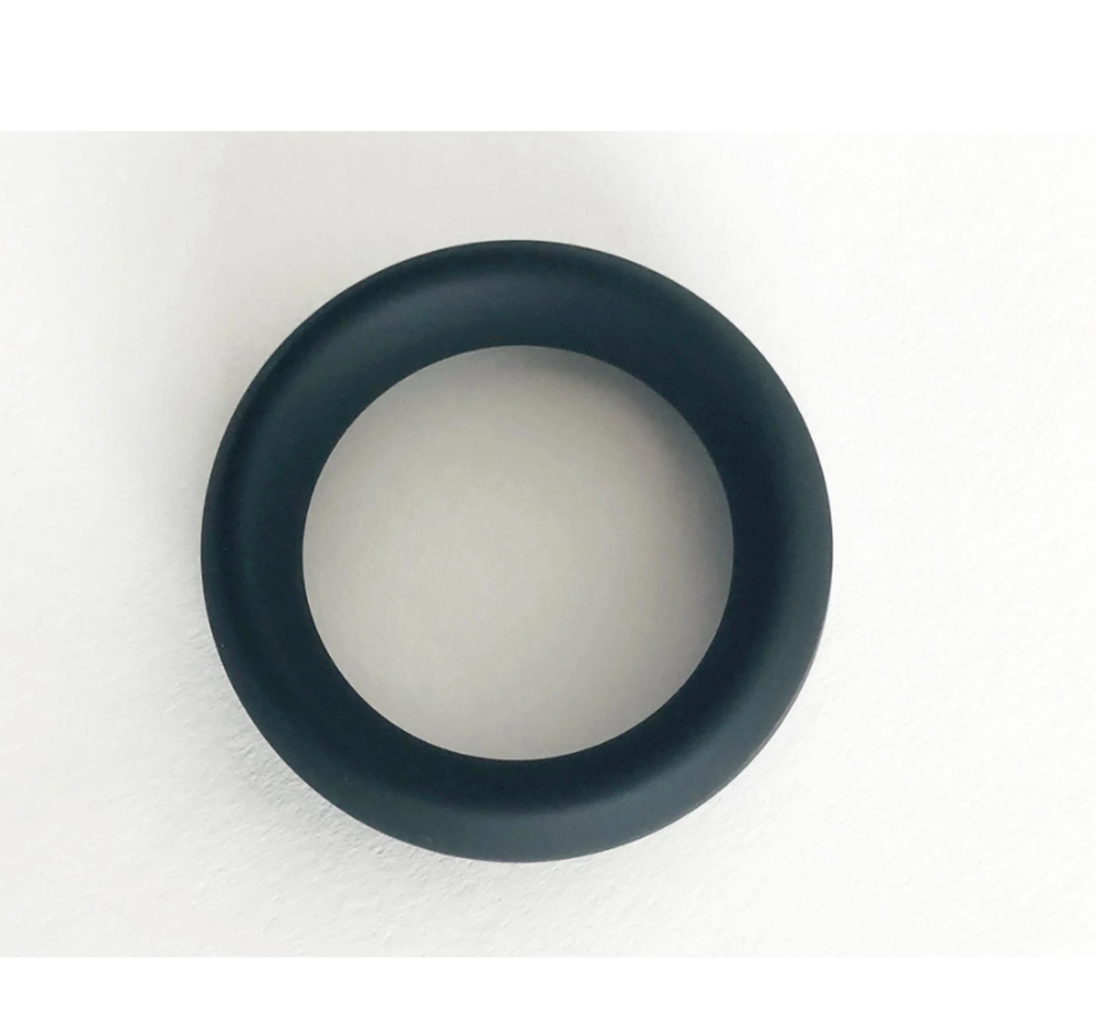 Black silicone cock ring with a thick girth.