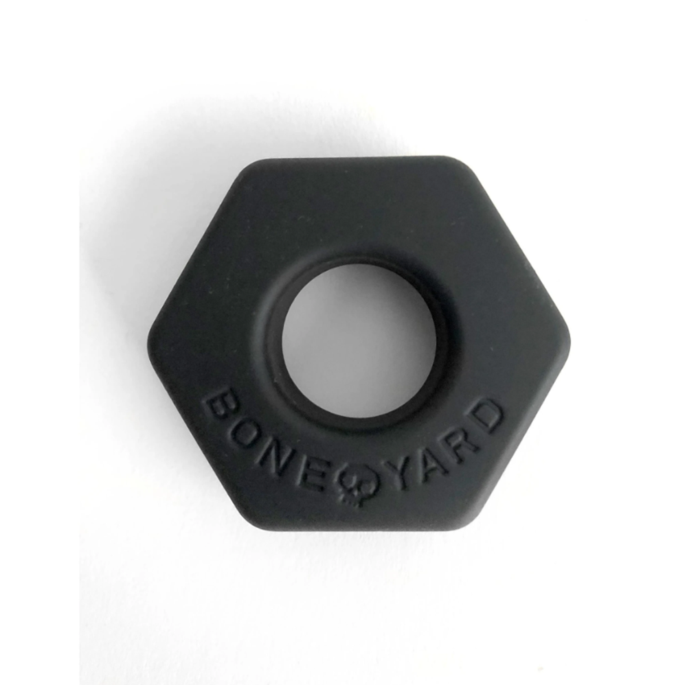 Black silicone hexagonal cock ring with "Boneyard" embossed.