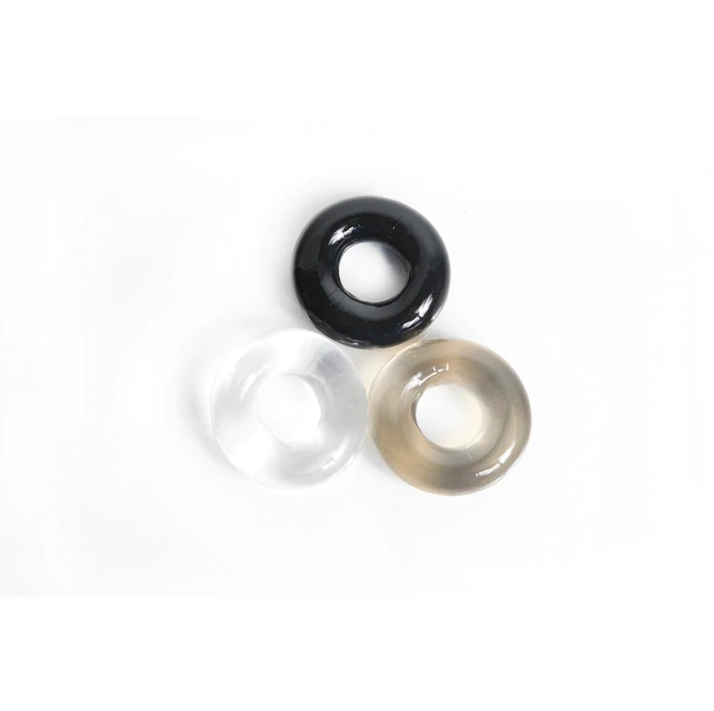 Three stretchy TPE cock rings in black, clear, and smoke.