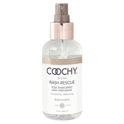 A clear bottle of Coochy Rash Rescue Post Shave Spray with a rose gold cap.