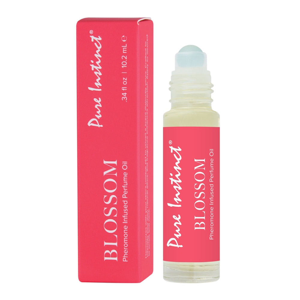 Pure Instinct Blossom Pheromone Perfume Oil roll-on bottle and box.