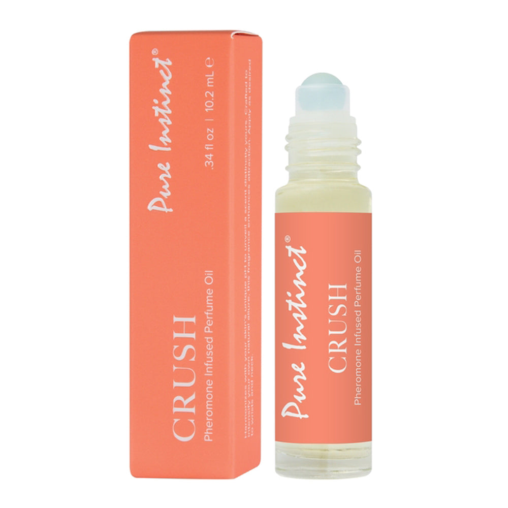 Pure Instinct Crush Pheromone Infused Perfume Oil roll-on bottle and box.