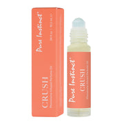 Pure Instinct Crush Pheromone Infused Perfume Oil roll-on bottle and box.