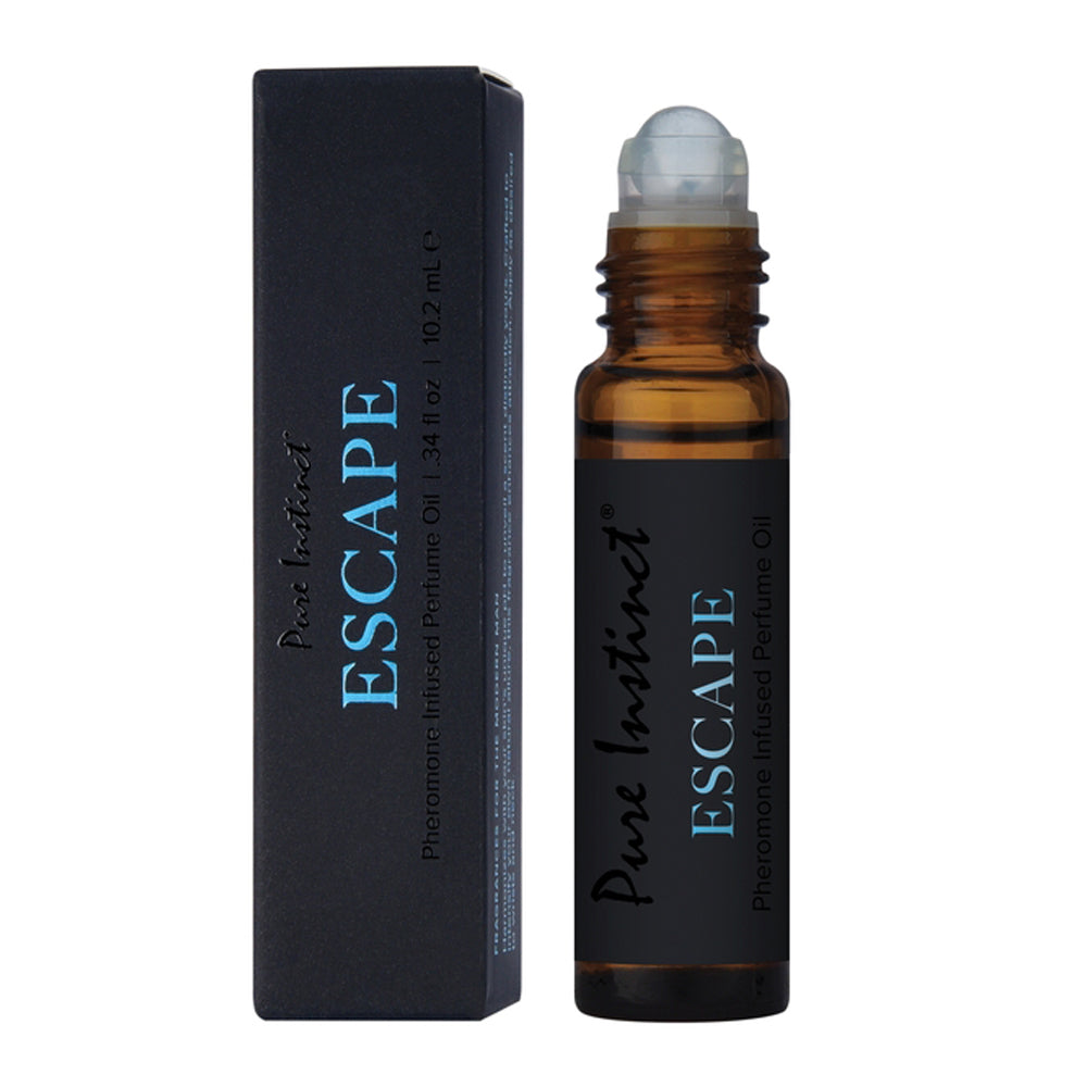 Pure Instinct Escape pheromone perfume oil rollerball and box.