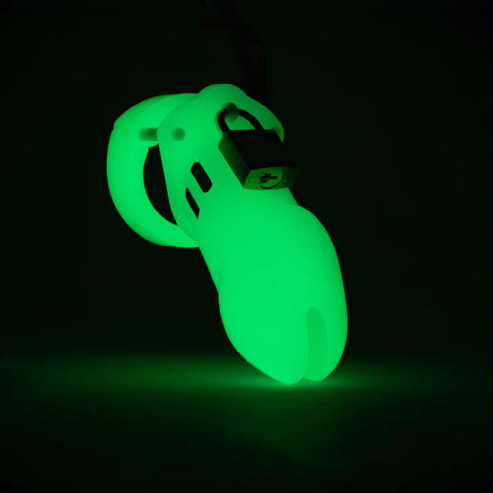 Glow-in-the-dark chastity cage with a lock.