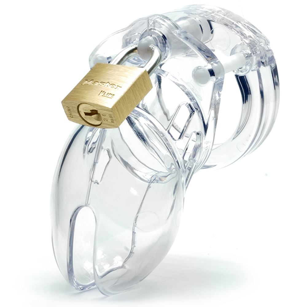 Clear polycarbonate chastity cage with a brass padlock.