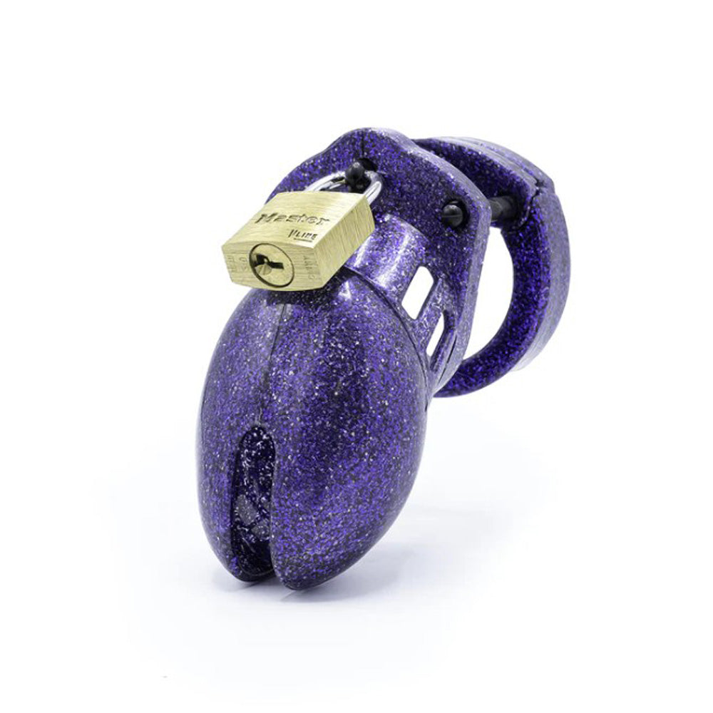 Purple glitter male chastity cage with a brass lock.
