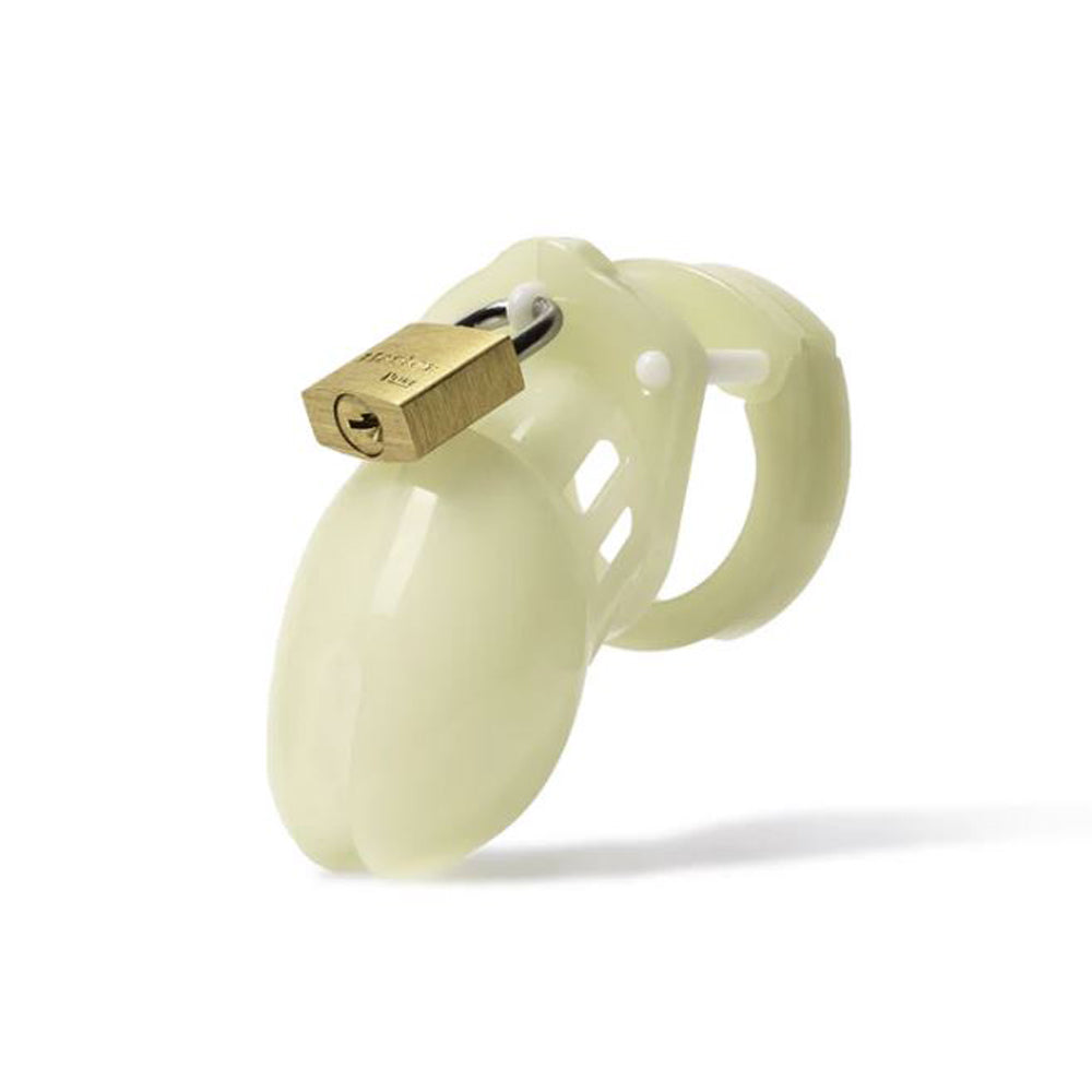 A glow-in-the-dark chastity cage with a brass lock.