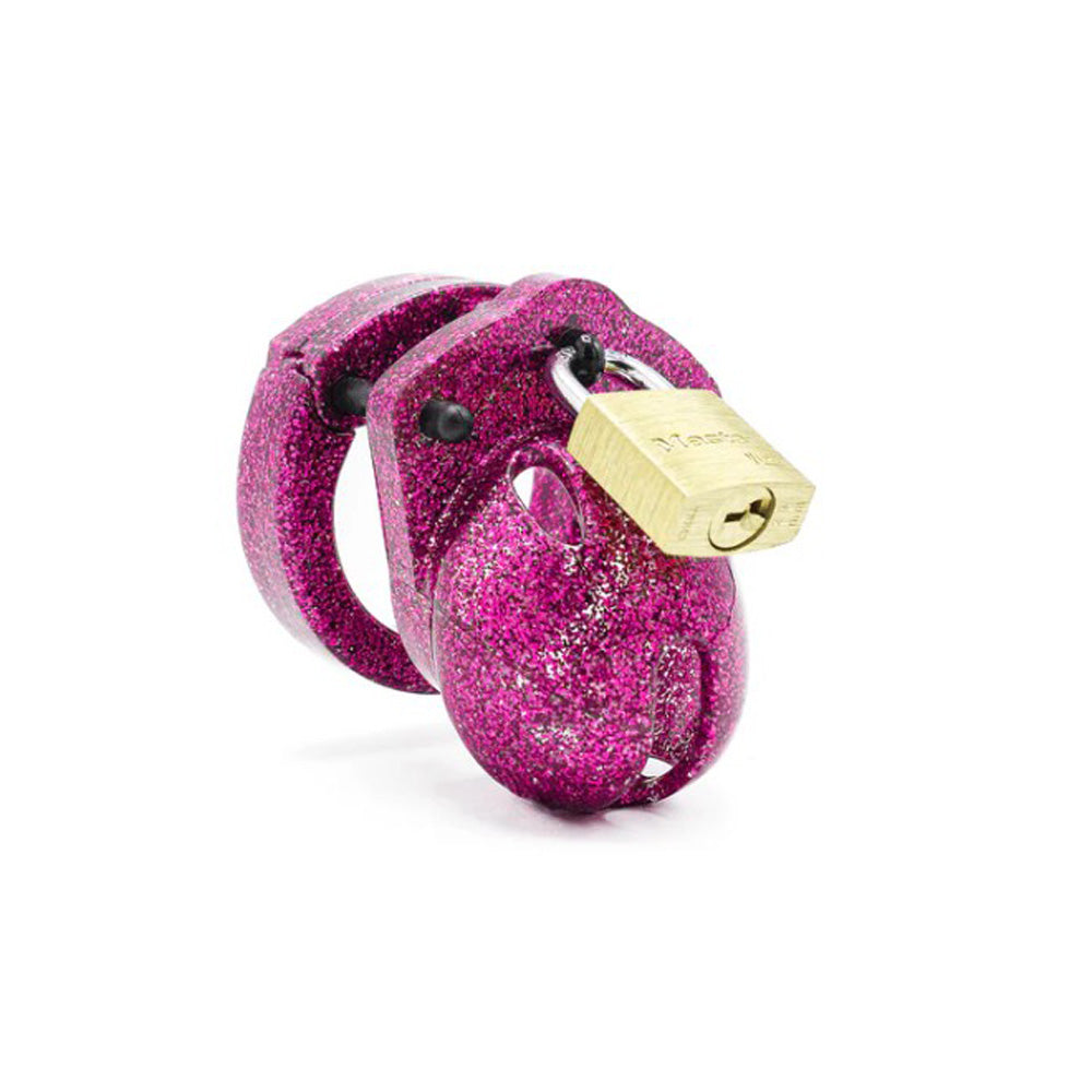 Pink glitter ABS micro chastity cage with a brass padlock.