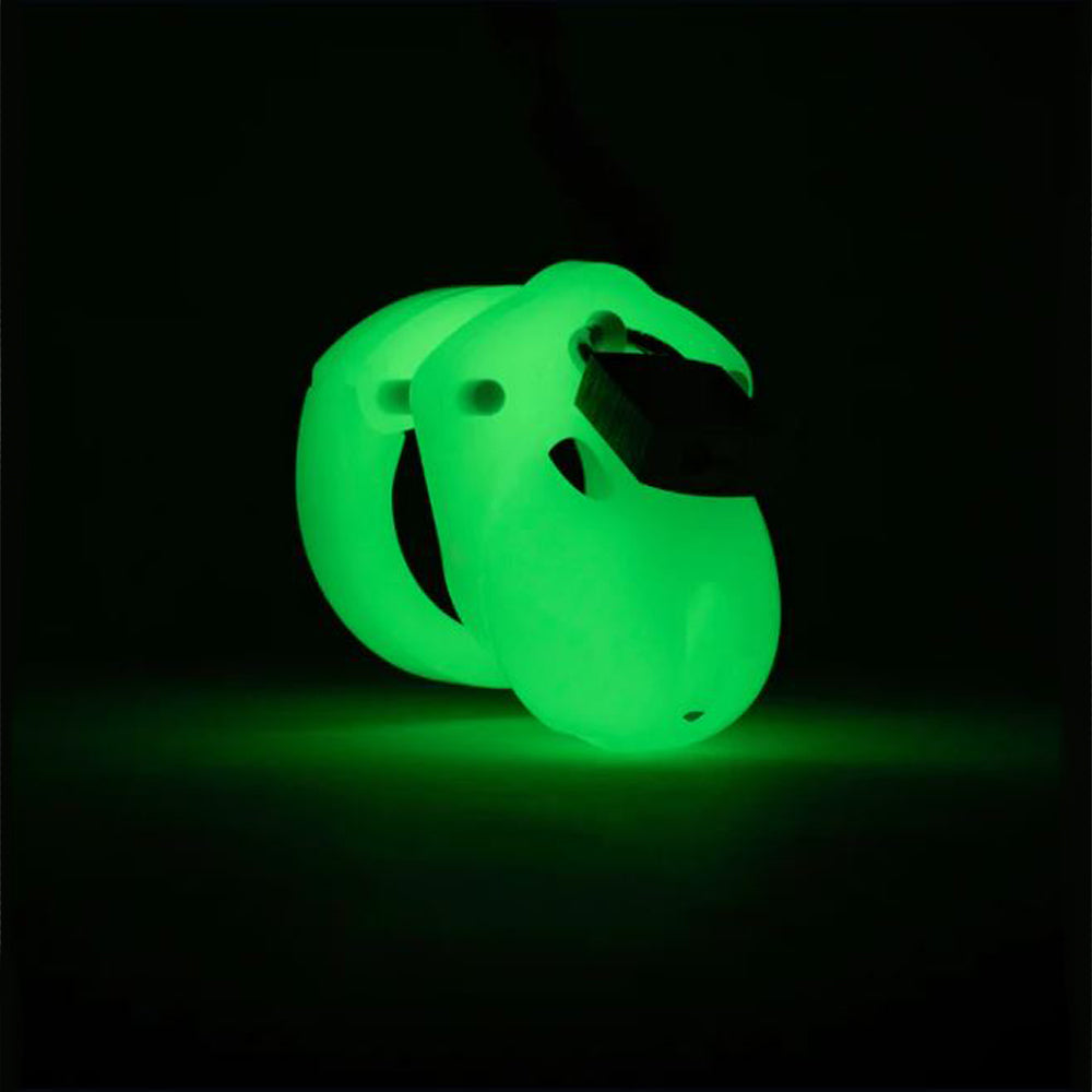 A glow-in-the-dark chastity cage with a black insert.