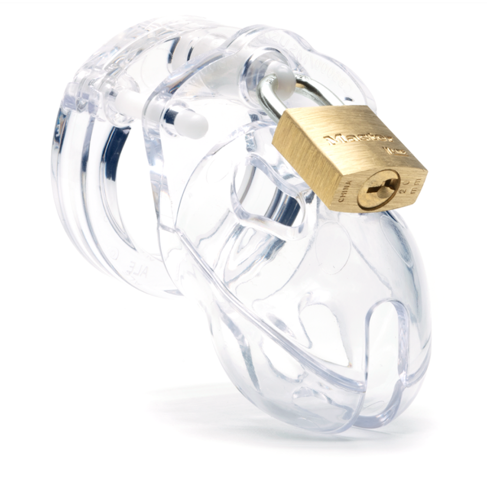 Clear polycarbonate chastity cage with a brass padlock.