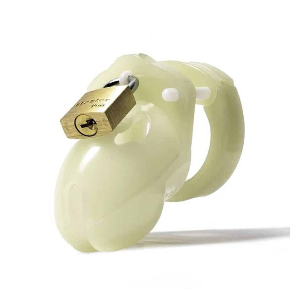 Mr. Stubb glow-in-the-dark male chastity cage with a brass lock.