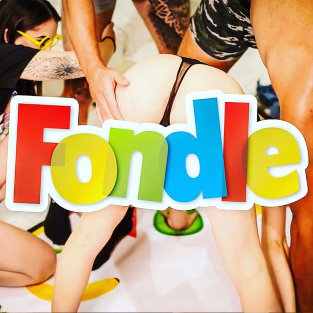 Fondle adult party board game with play mat and colorful letters.