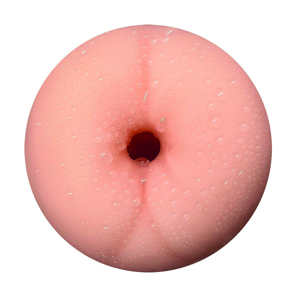 Realistic anal masturbator with a textured surface and water droplets.