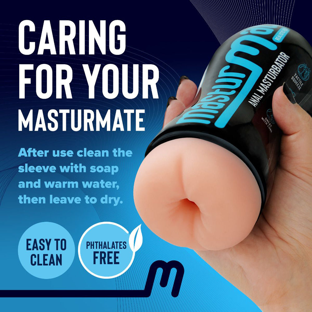 Hand holding a black squeezable masturbator with a cream-colored realistic anal sleeve.