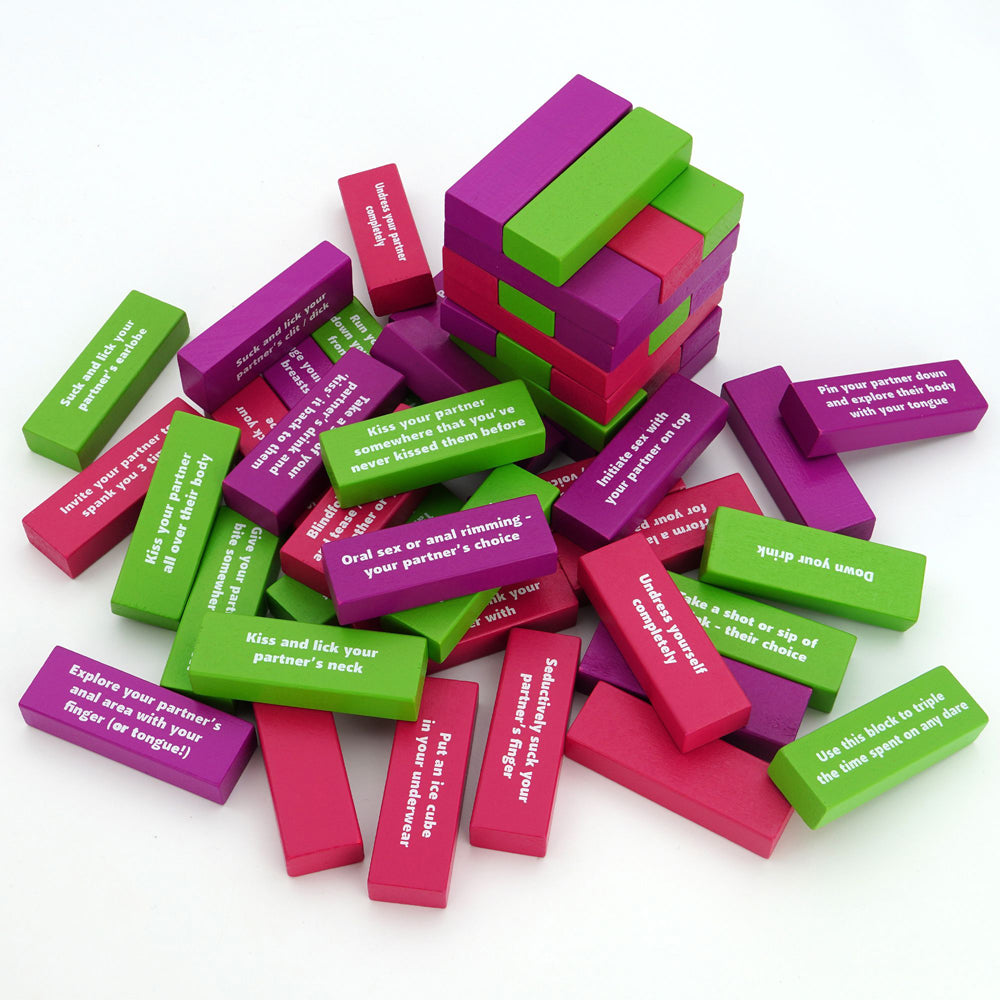 Erotic block game with colorful wooden blocks featuring suggestive dares.