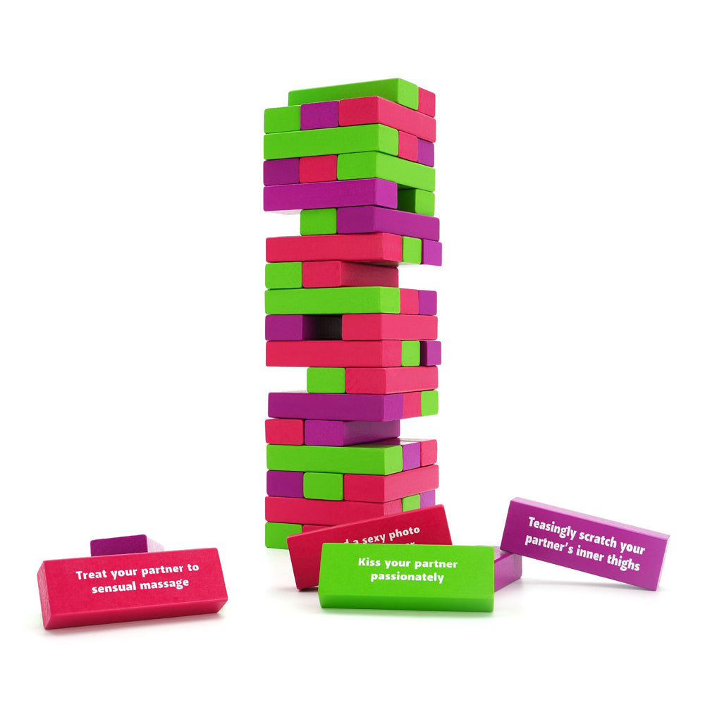 A Jenga-style game with pink, purple, and green blocks, some with erotic prompts.