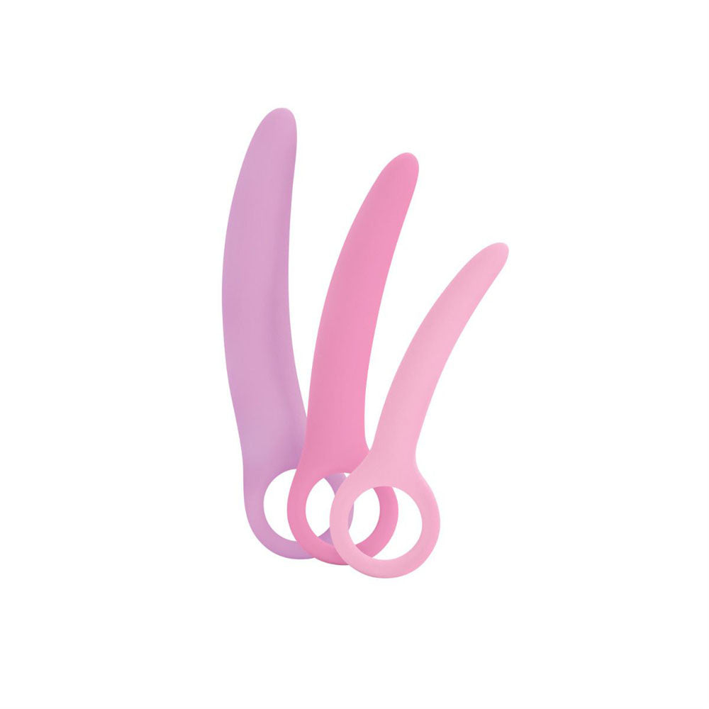 Curved silicone dilator set in purple, pink, and light pink.