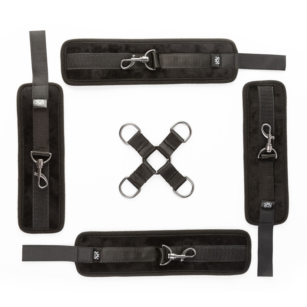 Black velvet padded restraint set with metal D-rings and clips.