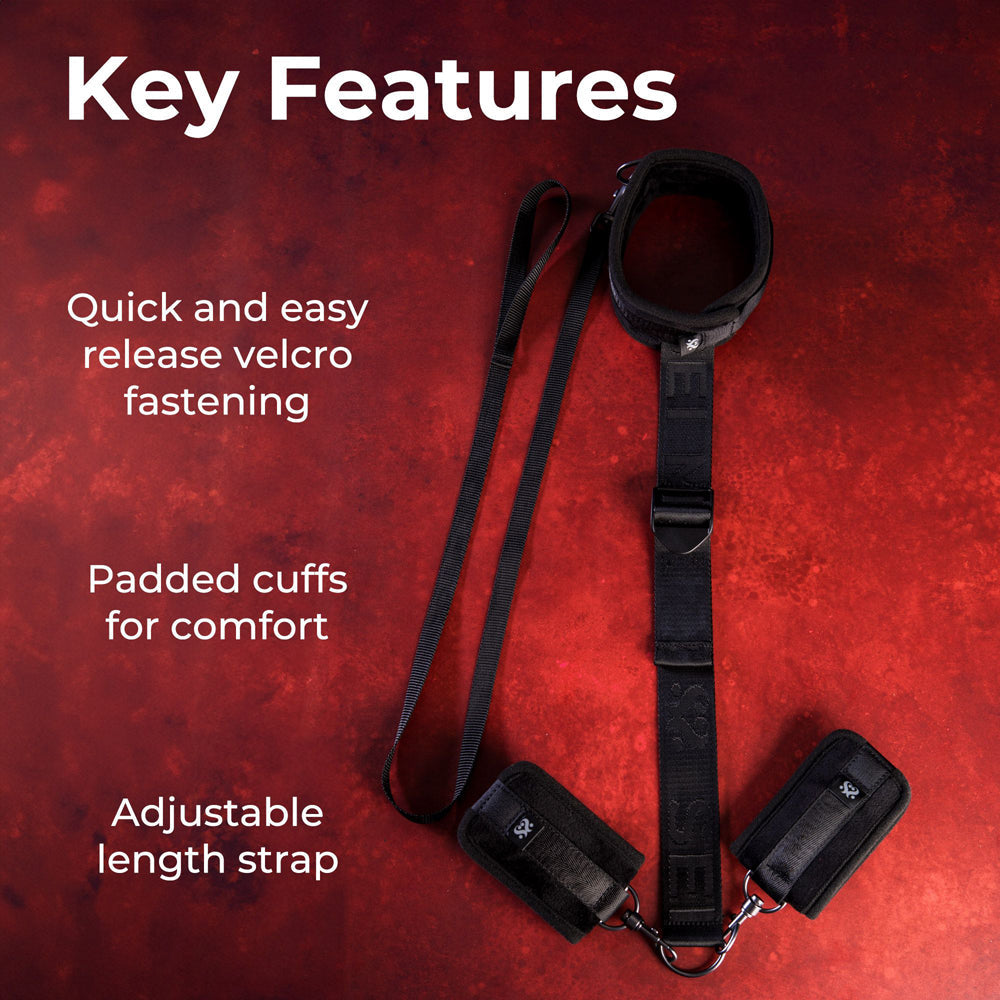 Adjustable neck and wrist restraint kit with padded cuffs.