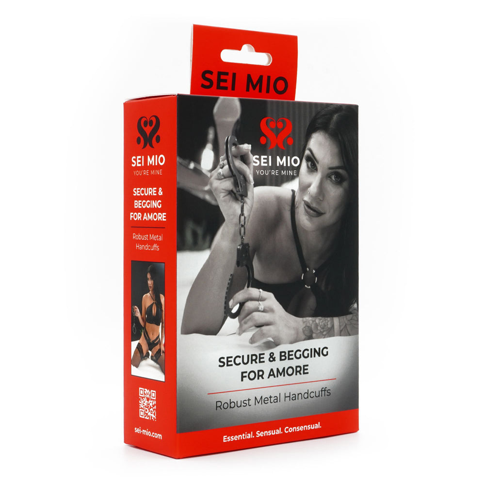 Sei Mio robust metal handcuffs with a woman holding them.