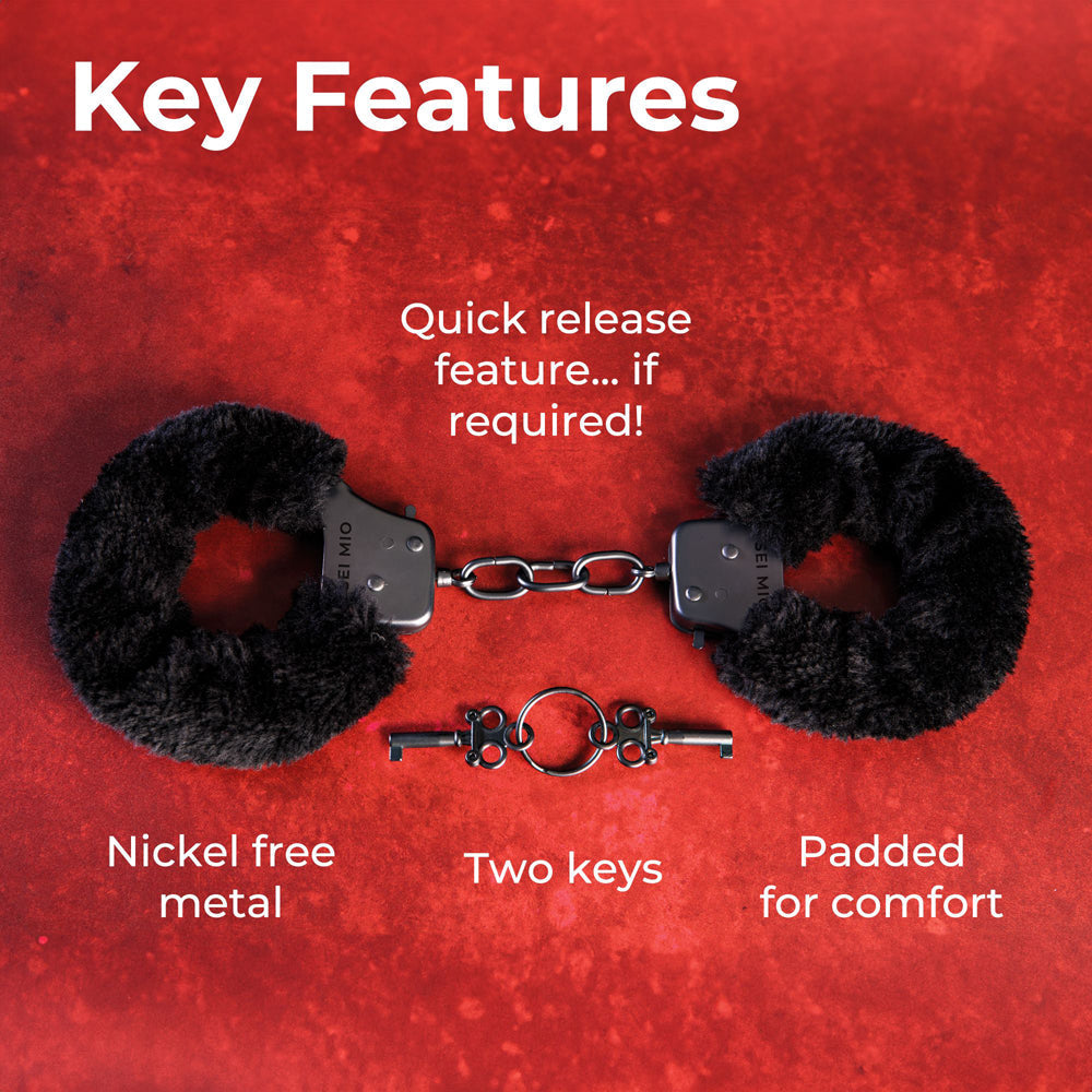 Furry metal handcuffs with quick release, two keys, and padded comfort.