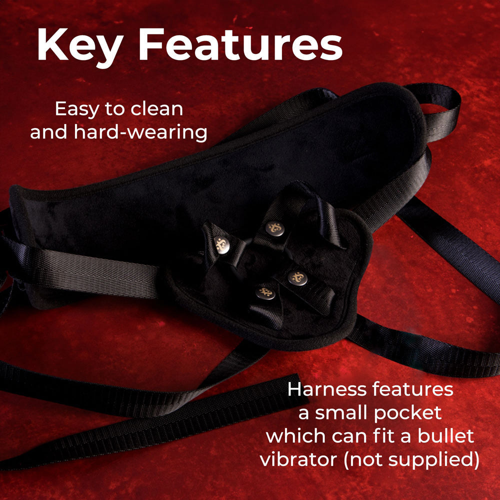 Black adjustable harness with O-rings and a pocket for a bullet vibrator.