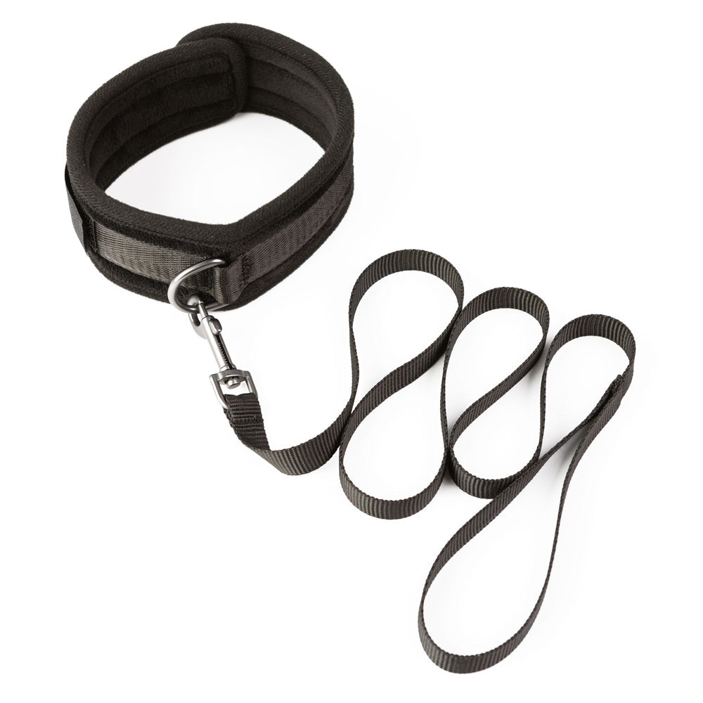 Black padded neck collar with a leash and metal clasp.