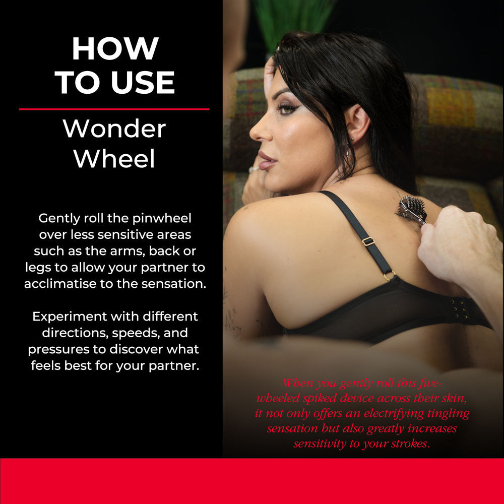 A hand uses a spiked pinwheel on a person's back.