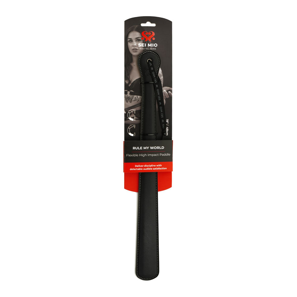 Flexible high impact faux leather spanking paddle with wrist loop.