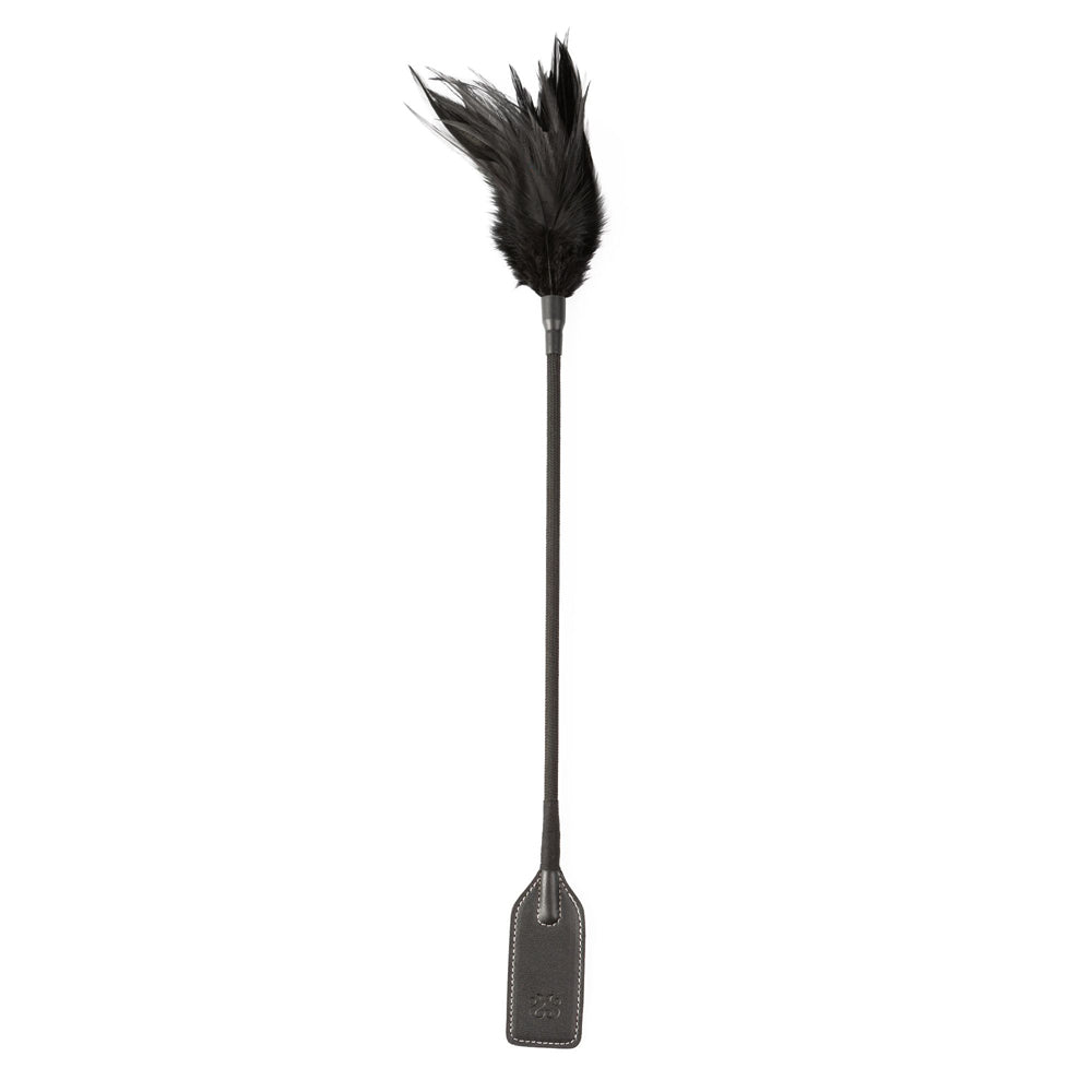 Black feather tickler on one end and a faux leather riding crop on the other.