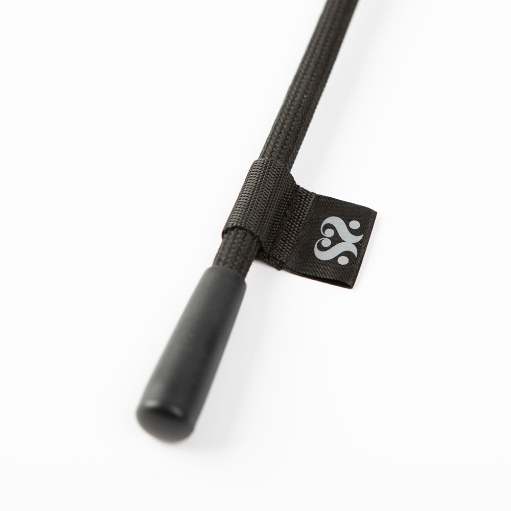 Black feather tickler with a short handle and a logo tag.