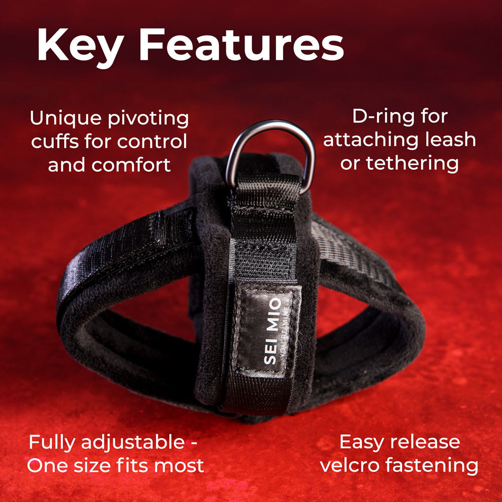 Velvet wrist cuffs with D-rings and velcro fastening.