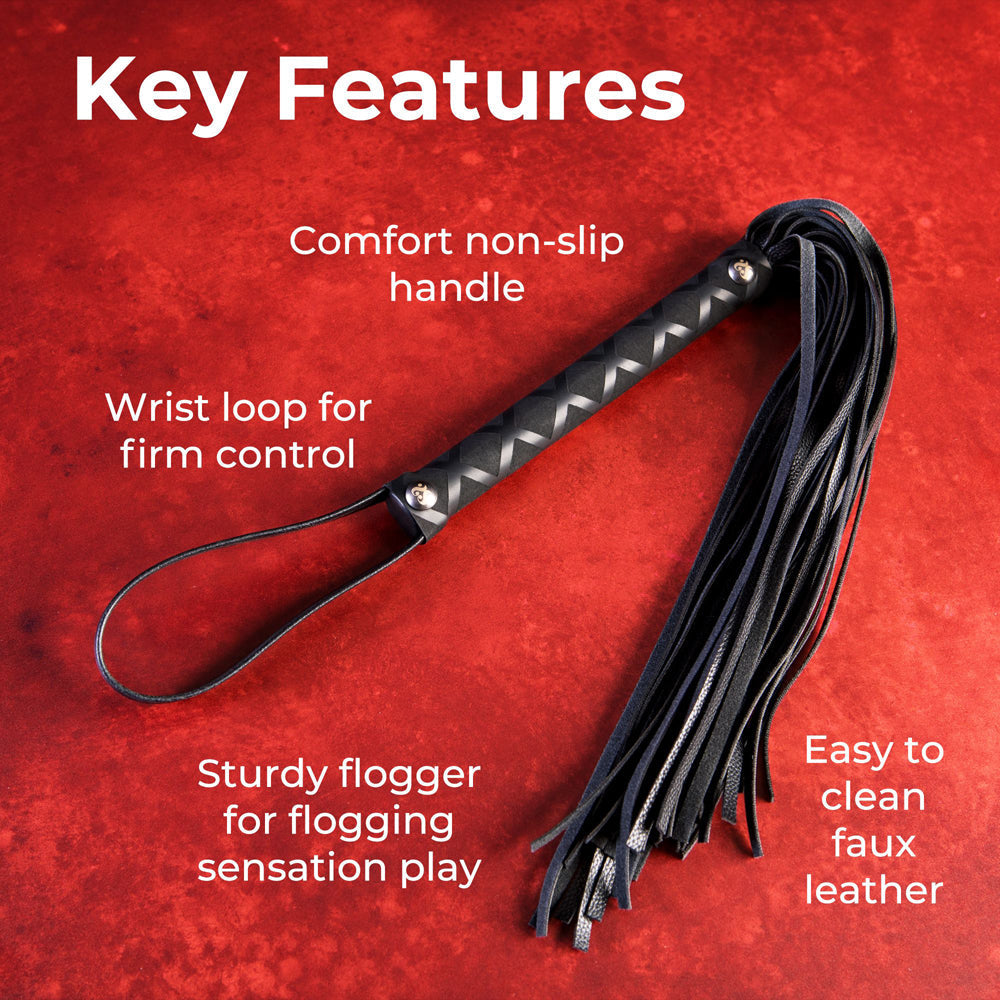 Faux leather flogger with a non-slip handle and wrist loop.