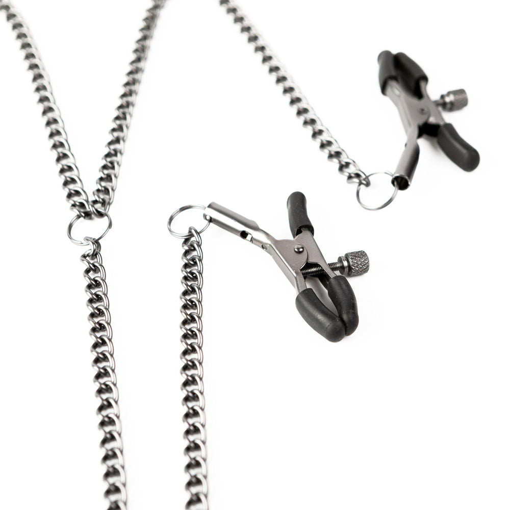 Adjustable nipple clamps with chains and silicone tips.