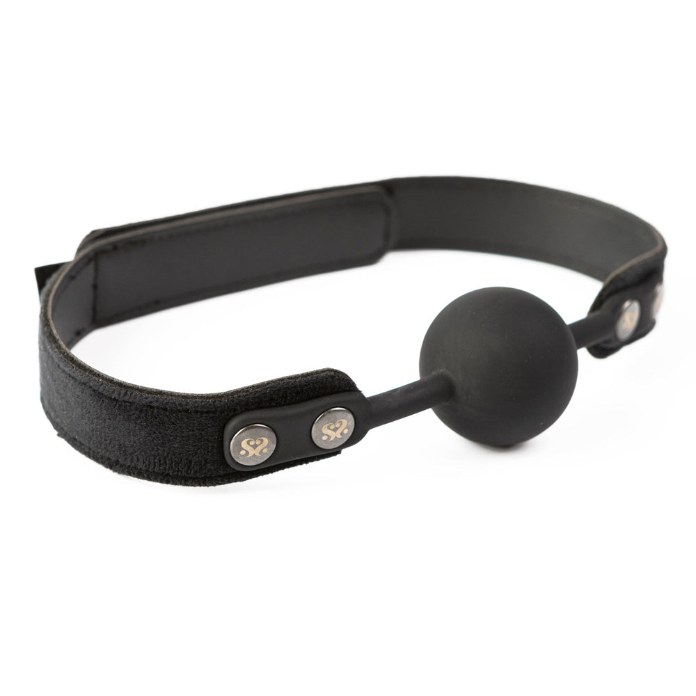 Black silicone ball gag with a velvet strap.